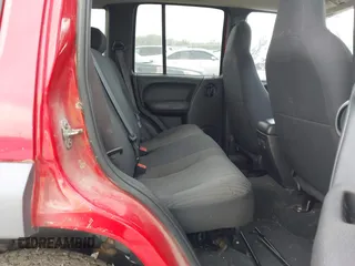 2003 Jeep Liberty Sport with VIN 1J4GL48K03W608325, listed as a IAAI auction lot 42033270 with 210,609 mi miles. Bid and sale history available at carsss.com. Image 8.