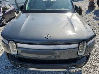 2024 Rivian R1S Adventure with VIN 7PDSGABA1RN030438, listed as a Copart auction lot 43439225 with 0 mi miles and Salvage Title. Bid and sale history available at carsss.com. Image 11.