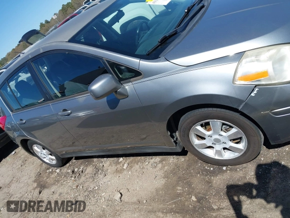 2012 Nissan Versa S with VIN 3N1BC1CP0CK206613, listed as a IAAI auction lot 41836647 with 180,698 mi miles. Bid and sale history available at carsss.com. Image 13.