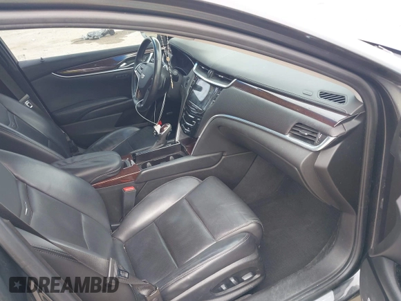2017 Cadillac XTS Luxury with VIN 2G61M5S35H9143656, listed as a IAAI auction lot 41929023 with 141,033 mi miles and . Bid and sale history available at DreamBid. Image 5.