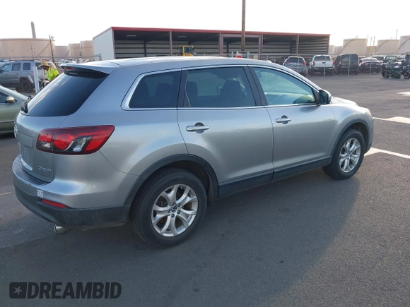 2015 Mazda CX-9 Sport with VIN JM3TB2BA3F0464294, listed as a IAAI auction lot 40848645 with 116,778 mi miles and . Bid and sale history available at carsss.com. Image 4.