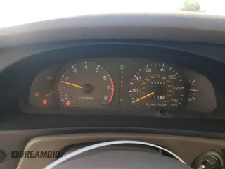 1994 Toyota Camry LE z VIN JT2GK12EXR0070117, wystawiony jako Copart lot #75997244 z przebiegiem 185 759 mil mil oraz Czysty tytuł • Clean title. Historia ofert i sprzedaży dostępna na DreamBid. Obrazek 9.
