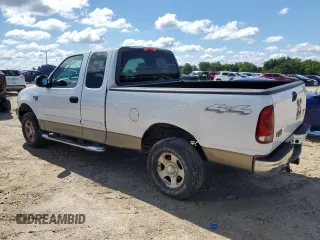 2004 Ford F-150 XL with VIN 2FTRX18W34CA64873, listed as a Copart auction lot 63946475 with 73,423 mi miles and Salvage title. Bid and sale history available at DreamBid. Image 2.