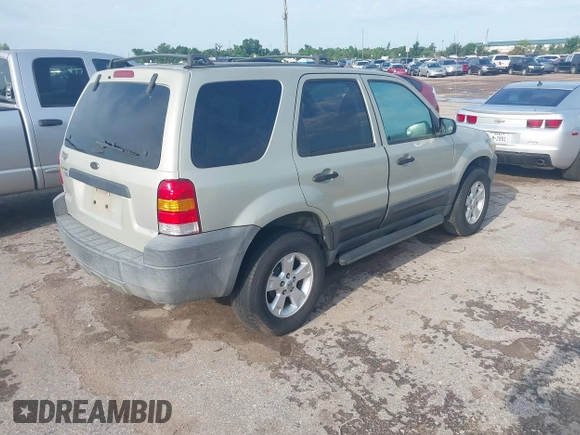 2005 Ford Escape XLT with VIN 1FMYU03145KA40360, listed as a IAAI auction lot 42511276 with 151,269 mi miles and . Bid and sale history available at DreamBid. Image 4.