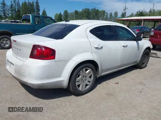 2014 Dodge Avenger SE with VIN 1C3CDZAB0EN219318, listed as a IAAI auction lot 42479311 with 209,224 mi miles and . Bid and sale history available at DreamBid. Image 4.