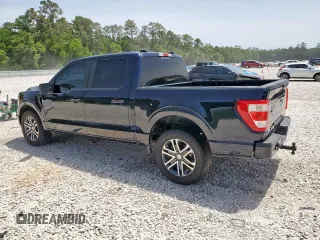 2023 Ford F-150 XL with VIN 1FTEW1CP8PKF56672, listed as a Copart auction lot 56911865 with 34,124 mi miles and Non repairable. Bid and sale history available at DreamBid. Image 2.