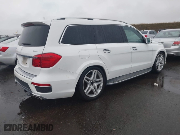 2014 Mercedes-Benz GL-Class GL 550 with VIN 4JGDF7DEXEA328392, listed as a IAAI auction lot 41187269 with 1 mi miles. Bid and sale history available at carsss.com. Image 4.
