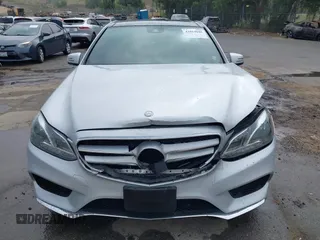 2014 Mercedes-Benz E with VIN WDDHF5KB8EB009303, listed as a IAAI auction lot 42014846 with 97,214 mi miles. Bid and sale history available at carsss.com. Image 12.