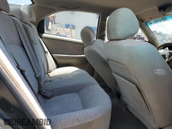 2006 Kia Optima LX z VIN KNAGD126865452524, wystawiony jako Copart lot #59813015 z przebiegiem 130 090 mil mil oraz Szkoda całkowita • Salvage title. Historia ofert i sprzedaży dostępna na DreamBid. Obrazek 10.