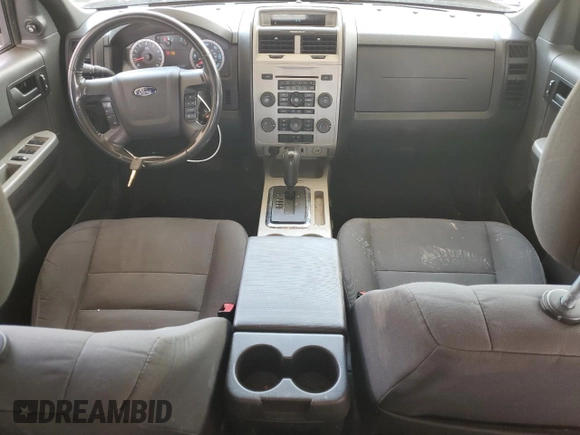 2012 Ford Escape XLT с VIN 1FMCU9D7XCKC42473, выставлен на аукционе Copart как лот 57939895 с пробегом 229 689 миль миль и Списание • Salvage title. История ставок и продаж доступна на DreamBid. Изображение 8.