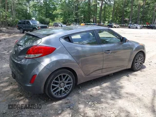 2012 Hyundai Veloster w/Black Int with VIN KMHTC6AD3CU078547, listed as a IAAI auction lot 42633915 with 143,633 mi miles and . Bid and sale history available at DreamBid. Image 4.