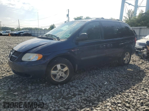 2005 Dodge Caravan SXT with VIN 1D4GP45R75B433581, listed as a Copart auction lot 66086095 with 98,096 mi miles and Salvage title. Bid and sale history available at DreamBid. Image 1.