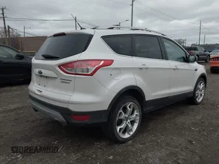 2013 Ford Escape Titanium with VIN 1FMCU0J96DUD85315, listed as a IAAI auction lot 41934204 with 152,132 mi miles and . Bid and sale history available at carsss.com. Image 4.