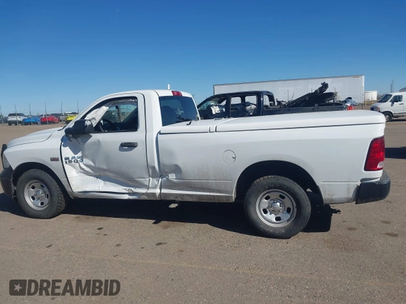 2015 Ram 1500 Tradesman with VIN 3C6JR7DT7FG584979, listed as a IAAI auction lot 41886286 with 60,982 mi miles and . Bid and sale history available at DreamBid. Image 14.