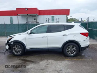 2014 Hyundai Santa Fe z VIN 5XYZTDLB5EG147354, wystawiony jako IAAI lot #42235940 z przebiegiem 107 466 mil mil oraz . Historia ofert i sprzedaży dostępna na DreamBid. Obrazek 14.