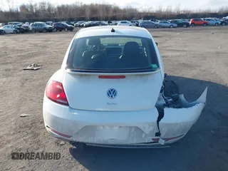2019 Volkswagen Beetle SE with VIN 3VWJD7AT6KM713525, listed as a IAAI auction lot 41508195 with 73,360 mi miles. Bid and sale history available at carsss.com. Image 16.