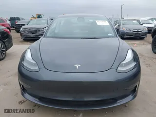 2022 Tesla Model 3 Performance with VIN 5YJ3E1EC9NF130410, listed as a IAAI auction lot 41711708 with 26,937 mi miles. Bid and sale history available at carsss.com. Image 13.
