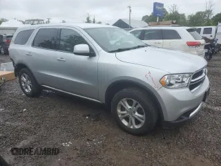 2012 Dodge Durango SXT with VIN 1C4RDJAG4CC106273, listed as a Copart auction lot 59767205 with 223,098 mi miles and Salvage title. Bid and sale history available at DreamBid. Image 4.