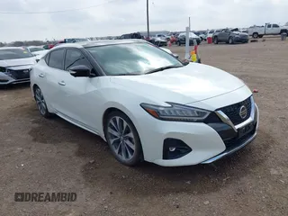 2022 Nissan Maxima Platinum z VIN 1N4AA6FV8NC508848, wystawiony jako IAAI lot #41524807 z przebiegiem 20 077 mil mil oraz . Historia ofert i sprzedaży dostępna na DreamBid. Obrazek 1.