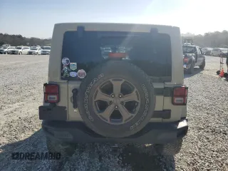 2018 Jeep Wrangler JK Unlimited Sport S with VIN 1C4BJWDG2JL871384, listed as a Copart auction lot 49990495 with 66,770 mi miles and Salvage Title. Bid and sale history available at carsss.com. Image 6.