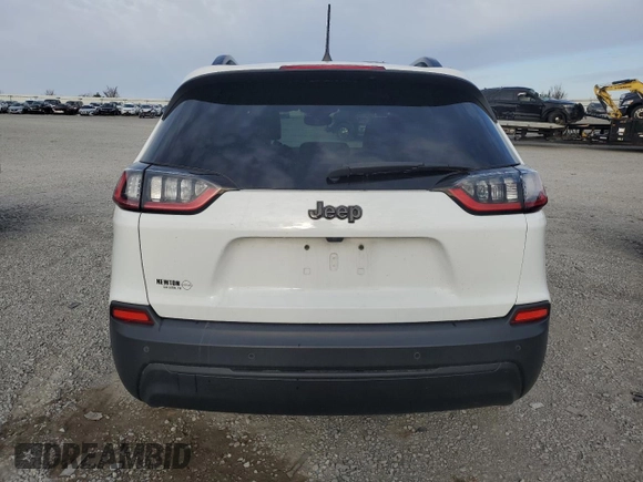 2021 Jeep Cherokee Latitude Plus z VIN 1C4PJLLB5MD112852, wystawiony jako Copart lot #51760005 z przebiegiem 80 804 mil mil oraz Szkoda całkowita • Salvage title. Historia ofert i sprzedaży dostępna na DreamBid. Obrazek 6.