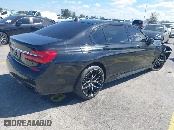 2016 BMW 7 Series 740i с VIN WBA7E2C51GG738889, выставлен на аукционе IAAI как лот 41838071 с пробегом 49 649 миль миль и . История ставок и продаж доступна на DreamBid. Изображение 4.