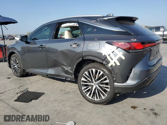 2024 Lexus RX with VIN 2T2BBMCA9RC030675, listed as a Copart auction lot 68138664 with 10,614 mi miles and Salvage Title. Bid and sale history available at carsss.com. Image 2.