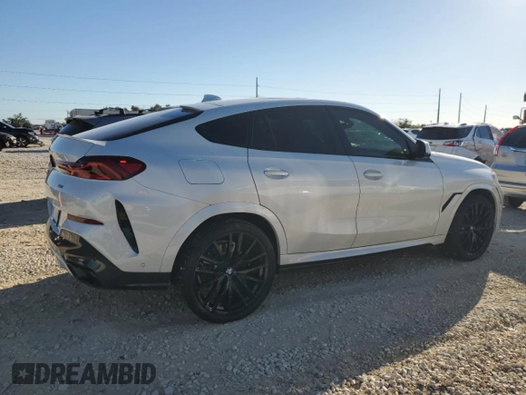 2021 BMW X6 sDrive40i z VIN 5UXCY4C01M9E24444, wystawiony jako Copart lot #79725094 z przebiegiem 119 066 mil mil oraz Czysty tytuł • Clean title. Historia ofert i sprzedaży dostępna na DreamBid. Obrazek 3.