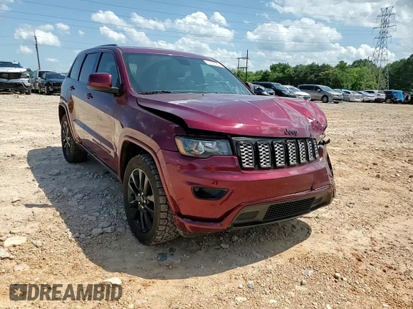 2017 Jeep Grand Cherokee Altitude with VIN 1C4RJEAG9HC702924, listed as a Copart auction lot 57897805 with 133,796 mi miles and Salvage title. Bid and sale history available at DreamBid. Image 14.