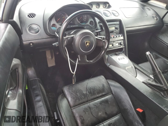 2005 Lamborghini Gallardo с VIN ZHWGU11S35LA02379, выставлен на аукционе Copart как лот 75365184 с пробегом 23 102 миль миль и На запчасти • Non repairable. История ставок и продаж доступна на DreamBid. Изображение 8.