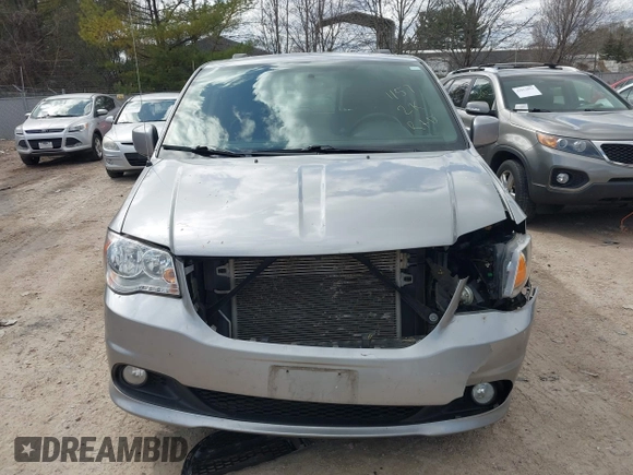 2017 Dodge Grand Caravan SXT with VIN 2C4RDGCG6HR671199, listed as a IAAI auction lot 42031157 with 99,189 mi miles and . Bid and sale history available at DreamBid. Image 12.