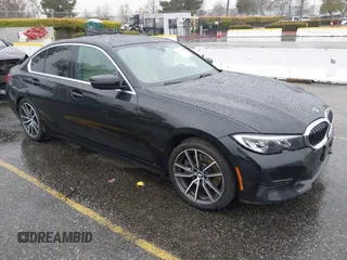2020 BMW 3 Series 330i with VIN 3MW5R1J04L8B04966, listed as a IAAI auction lot 41734254 with 82,864 mi miles. Bid and sale history available at carsss.com. Image 1.