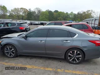 2016 Nissan Altima SL with VIN 1N4BL3AP0GC273371, listed as a IAAI auction lot 41910585 with 152,546 mi miles and . Bid and sale history available at DreamBid. Image 14.