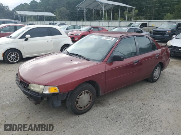 1997 Mitsubishi Mirage DE z VIN JA3AY26AXVU007285, wystawiony jako Copart lot #71958454 z przebiegiem 156 415 mil mil oraz Szkoda całkowita • Salvage title. Historia ofert i sprzedaży dostępna na DreamBid. Obrazek 1.