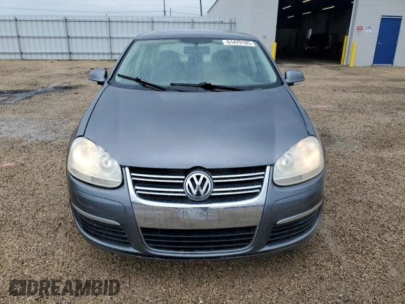 2007 Volkswagen Jetta 2.5 z VIN 3VWSF71K57M106657, wystawiony jako Copart lot #61479105 z przebiegiem 94 898 mil mil oraz Szkoda całkowita • Salvage title. Historia ofert i sprzedaży dostępna na DreamBid. Obrazek 5.