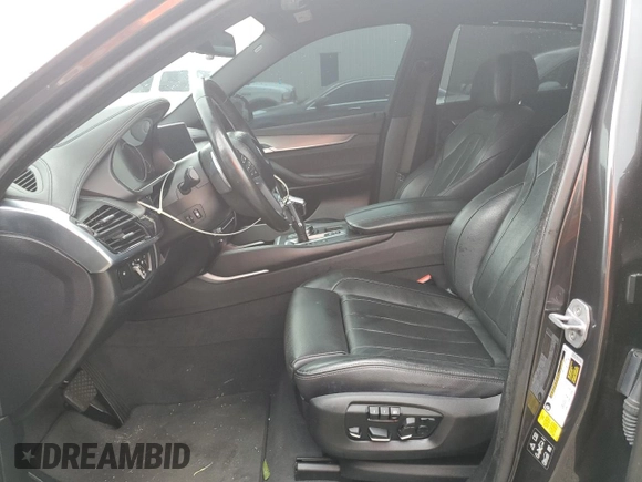 2018 BMW X6 xDrive50i with VIN 5UXKU6C5XJ0W39056, listed as a Copart auction lot 75116634 with 90,043 mi miles and Salvage Title. Bid and sale history available at carsss.com. Image 7.