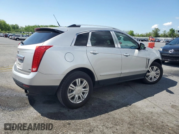 2014 Cadillac SRX Luxury Collection z VIN 3GYFNEE37ES630832, wystawiony jako Copart lot #56335035 z przebiegiem 102 076 mil mil oraz Szkody całkowita. Historia ofert i sprzedaży dostępna na DreamBid. Obrazek 3.