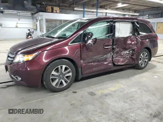 2014 Honda Odyssey Touring with VIN 5FNRL5H93EB079817, listed as a Copart auction lot 56231645 with 65,521 mi miles and Salvage title. Bid and sale history available at DreamBid. Image 1.