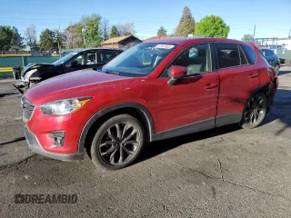 2016 Mazda CX-5 Grand Touring z VIN JM3KE4DY9G0753691, wystawiony jako Copart lot #57361645 z przebiegiem 90 733 mil mil oraz Szkoda całkowita • Salvage title. Historia ofert i sprzedaży dostępna na DreamBid. Obrazek 1.
