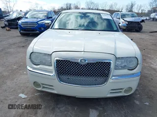 2008 Chrysler 300 C Hemi with VIN 2C3KA63H18H335807, listed as a IAAI auction lot 41986105 with 149,837 mi miles and . Bid and sale history available at carsss.com. Image 12.