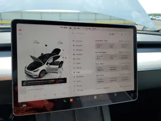2023 Tesla Model Y Long Range with VIN 7SAYGAEE6PF795434, listed as a Copart auction lot 67507984 with 24,469 mi miles and Salvage Title. Bid and sale history available at DreamBid. Image 9.