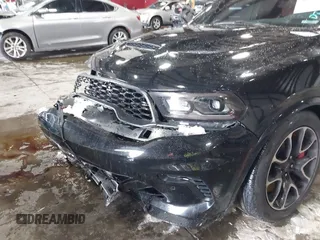 2023 Dodge Durango SRT Hellcat Premium z VIN 1C4SDJH90PC596225, wystawiony jako IAAI lot #41600943 z przebiegiem 18 877 mil mil oraz . Historia ofert i sprzedaży dostępna na DreamBid. Obrazek 6.