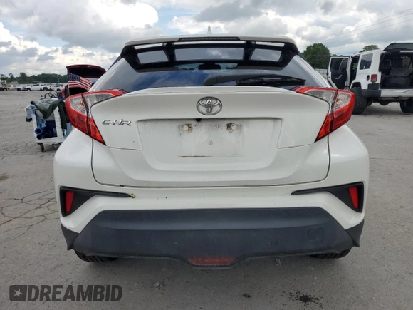 2018 Toyota C-HR XLE с VIN NMTKHMBX6JR016848, выставлен на аукционе Copart как лот 56939615 с пробегом 65 510 миль миль и Списание • Salvage title. История ставок и продаж доступна на DreamBid. Изображение 6.