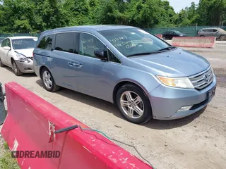 2012 Honda Odyssey Touring с VIN 5FNRL5H96CB043889, выставлен на аукционе IAAI как лот 42311407 с пробегом 209 598 миль миль и . История ставок и продаж доступна на DreamBid. Изображение 1.