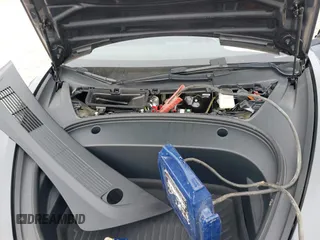 2023 Tesla Model 3 with VIN 5YJ3E1EA5PF474382, listed as a IAAI auction lot 41764268 with 31,040 mi miles and . Bid and sale history available at DreamBid. Image 10.