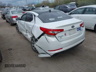 2012 Kia Optima SX with VIN 5XXGR4A6XCG079419, listed as a IAAI auction lot 41989957 with 159,794 mi miles and . Bid and sale history available at carsss.com. Image 3.