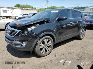 2011 Kia Sportage EX z VIN KNDPC3A25B7034128, wystawiony jako Copart lot #56207055 z przebiegiem 166 605 mil mil oraz Szkoda całkowita • Salvage title. Historia ofert i sprzedaży dostępna na DreamBid. Obrazek 1.