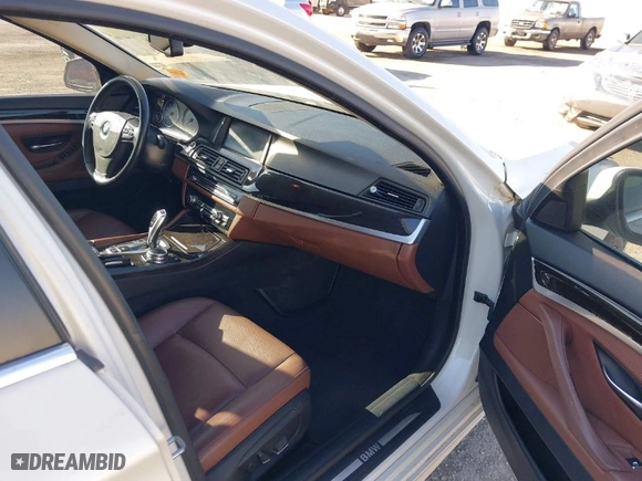 2014 BMW 5 Series 528i with VIN WBA5A5C57ED504582, listed as a IAAI auction lot 41699668 with 113,792 mi miles. Bid and sale history available at carsss.com. Image 5.