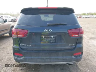 2020 Kia Sorento EX z VIN 5XYPHDA58LG708648, wystawiony jako IAAI lot #42022837 z przebiegiem 80 127 mil mil oraz . Historia ofert i sprzedaży dostępna na DreamBid. Obrazek 16.