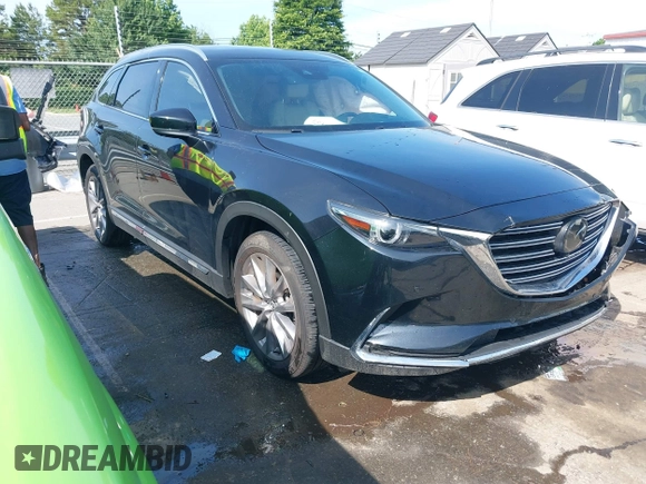 2021 Mazda CX-9 Carbon Edition with VIN JM3TCBDY3M0524241, listed as a IAAI auction lot 42538127 with 50,533 mi miles and . Bid and sale history available at DreamBid. Image 1.
